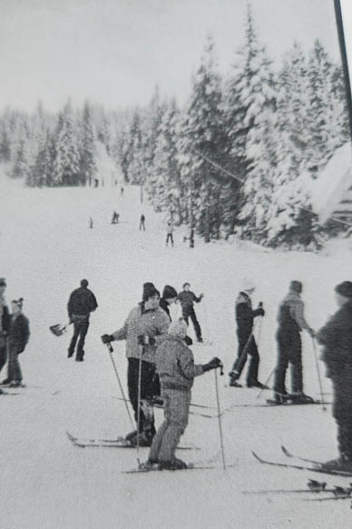 first year of rope tow, people waiting to grab the rope tow